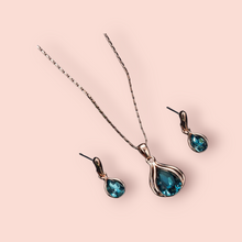 Load image into Gallery viewer, Peacock Blue Necklace and Earring Set with Rose Gold Accents
